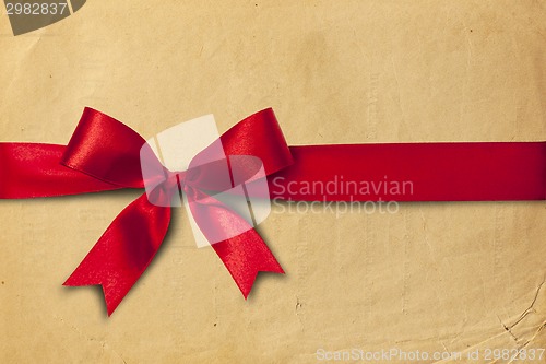 Image of Red ribbon and cartoon box