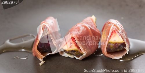 Image of Slices of figs in Prosciutto