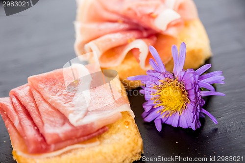 Image of Slices of figs in Prosciutto