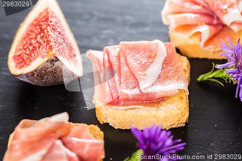 Image of Slices of figs in Prosciutto