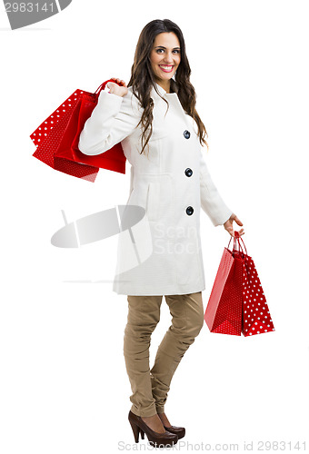 Image of Beautiful woman with shopping bags
