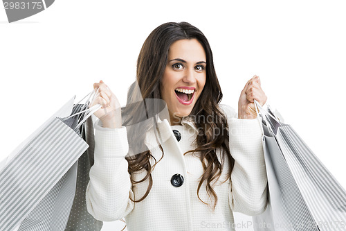 Image of Beautiful woman with shopping bags