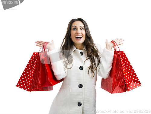 Image of Beautiful woman with shopping bags