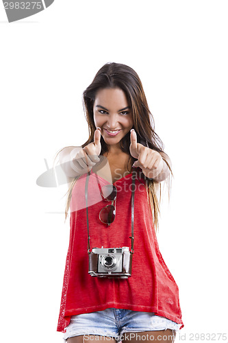 Image of Young woman with thumbs up