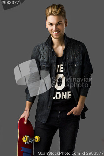 Image of Young man with a skateboard