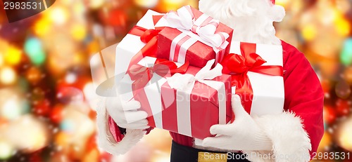 Image of close up of santa claus with gift box