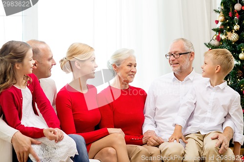 Image of smiling family at home