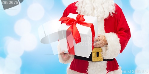 Image of close up of santa claus with gift box