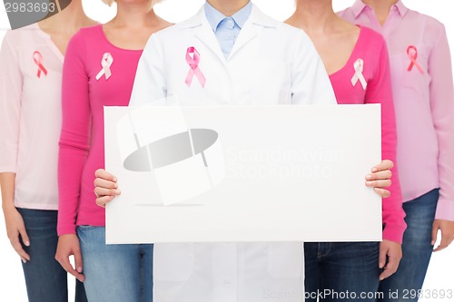 Image of close up of women with cancer awareness ribbons