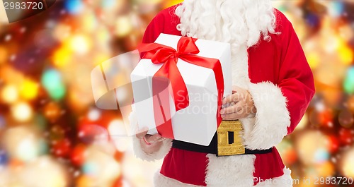 Image of close up of santa claus with gift box