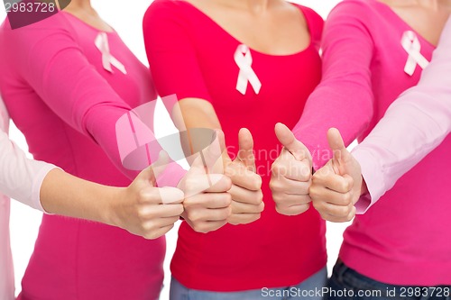 Image of close up of women with cancer awareness ribbons