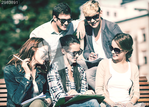 Image of group of students or teenagers hanging out