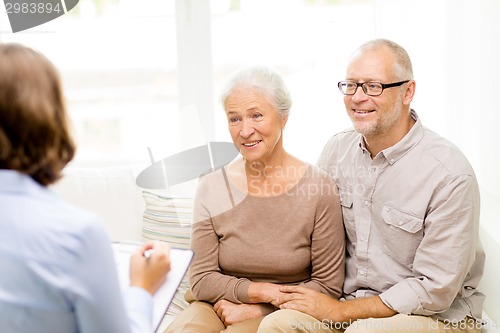 Image of happy senior couple at home