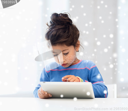 Image of girl with tablet pc at home