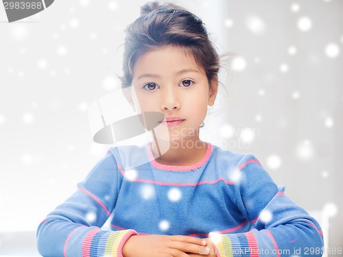 Image of little girl indoors