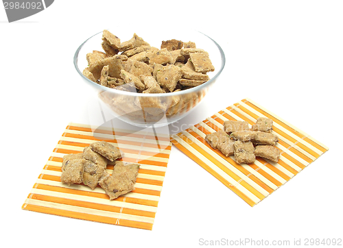 Image of Selfmade dog cookies in a bowl of glass