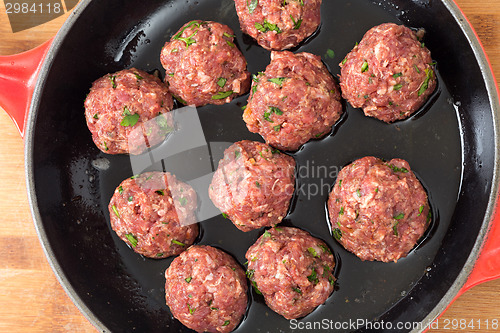 Image of Frying meatballs from above
