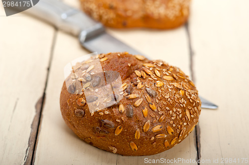 Image of organic bread over rustic table