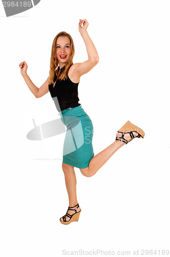 Image of Dancing young woman.