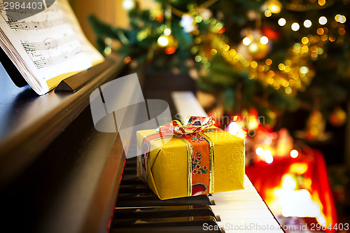 Image of Christmas gift on piano