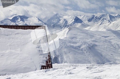 Image of Hotel in snow and ski slope