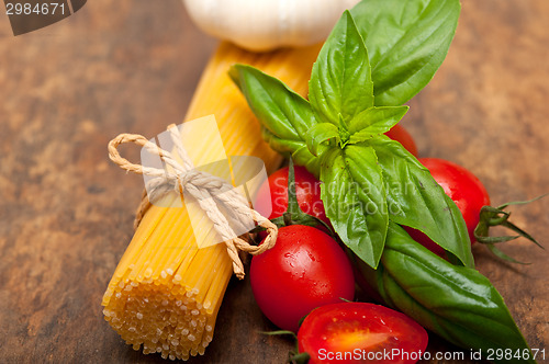 Image of Italian spaghetti pasta tomato and basil