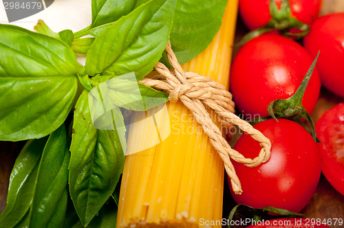 Image of Italian spaghetti pasta tomato and basil