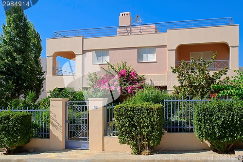 Image of House with trees.