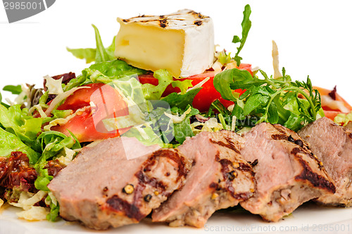 Image of Veal meat with fresh vegetable salad