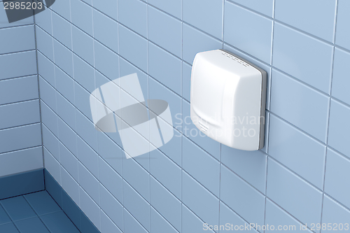 Image of Hand dryer in public toilet