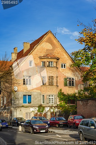 Image of Old fashioned house at city street