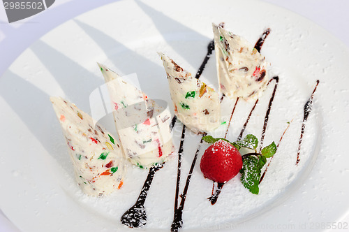 Image of Semifreddo with succades and strawberry
