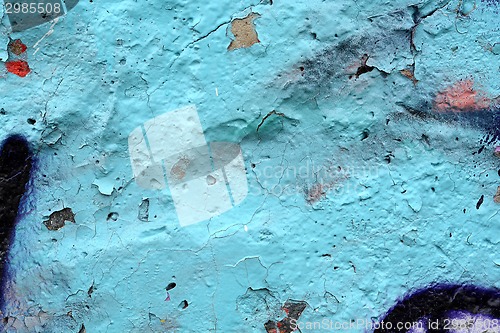 Image of Rough textured blue wall with stains