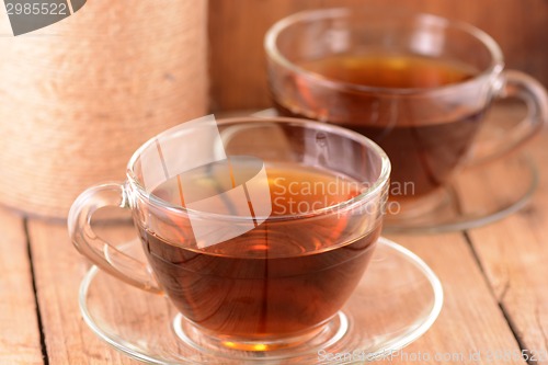 Image of A cup of tea on wooden background