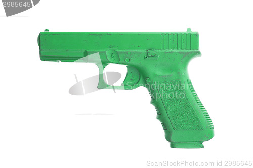 Image of Dirty green training gun isolated on white