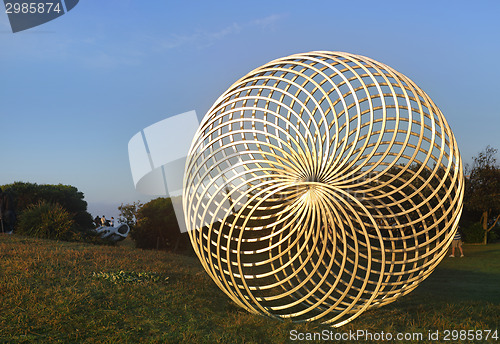 Image of Sisyphus shining gold in the morning sunlight