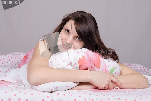 Image of Beautiful girl a great mood in bed