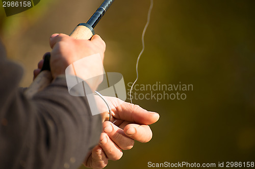 Image of Spinning in the hands of the angler 