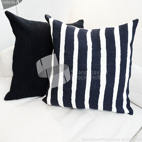 Image of Striped cushion on a sofa