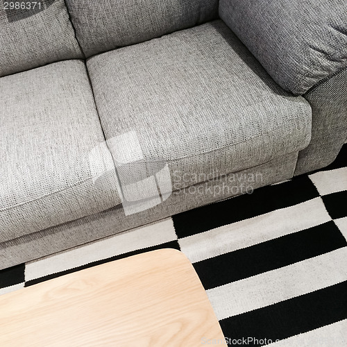 Image of Gray sofa and wooden coffee table