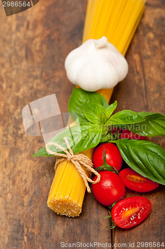 Image of Italian spaghetti pasta tomato and basil