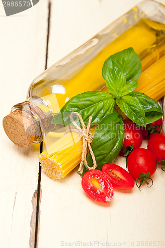 Image of Italian spaghetti pasta tomato and basil