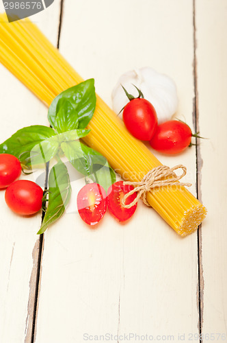 Image of Italian spaghetti pasta tomato and basil