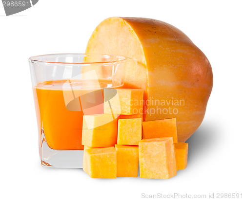 Image of Half Pumpkin And A Glass Of Pumpkin Juice