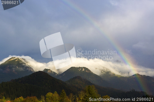 Image of Landscape of Bavarian mountains with rainbow