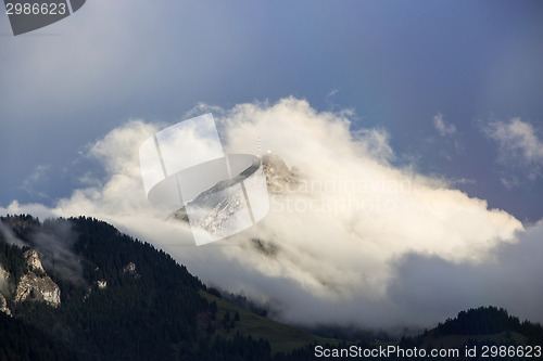 Image of Bavarian mountain Wendelstein with fog in autumn