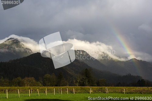 Image of Landscape of Bavarian mountains with rainbow