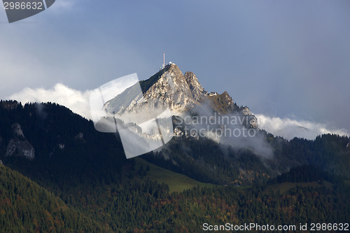 Image of Bavarian mountain Wendelstein with fog in autumn