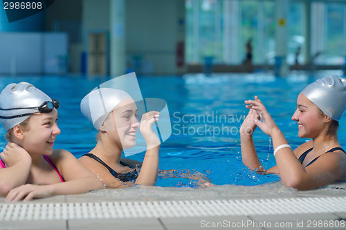 Image of children group  at swimming pool