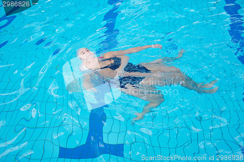 Image of help and rescue on swimming pool